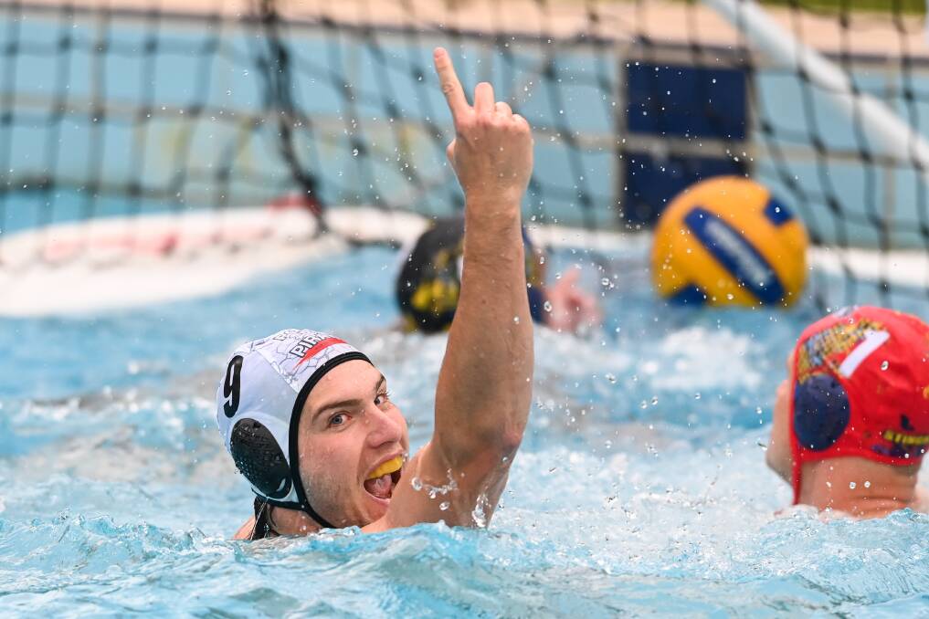 EXCITING SCENES: Pool Pirates' Sam Maroney celebrates in the pool during his side's clash against Northside Stingrays in Albury on the weekend. Picture: MARK JESSER