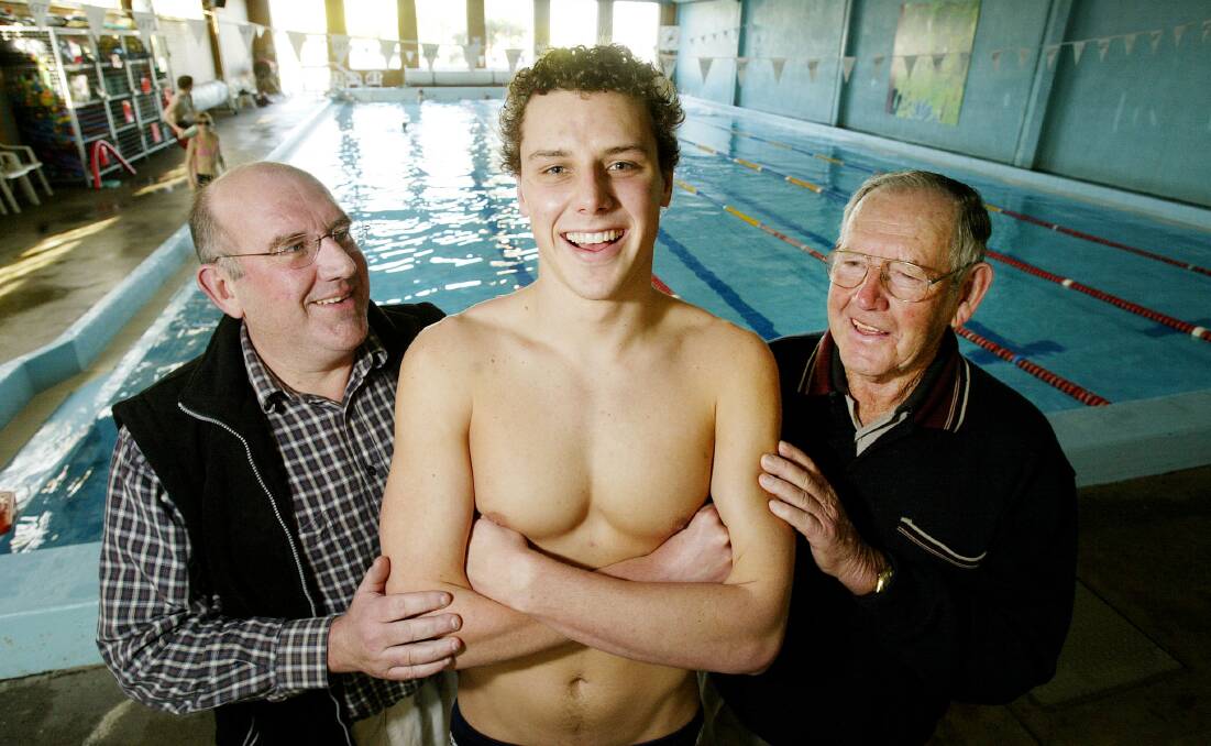 FAMILY: Patrick Murphy with his father Brian and grandfather Ossie at GT Aquatics in Lavington back in 2005 before the World Championships in Canada.