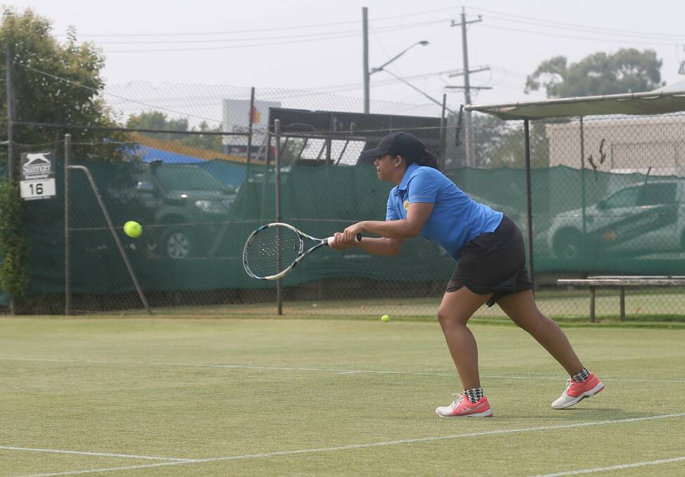 FOCUSED: Ansuya Chetty from the South African team tests out the Albury grasscourts for the start of the Margaret Court Cup. 