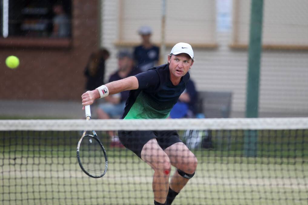 IN THE ZONE: Albury's Jade Culph slices a backhand during the men's open semi final at the Wodonga Labour Day tournament. Picture: TARA TREWHELLA