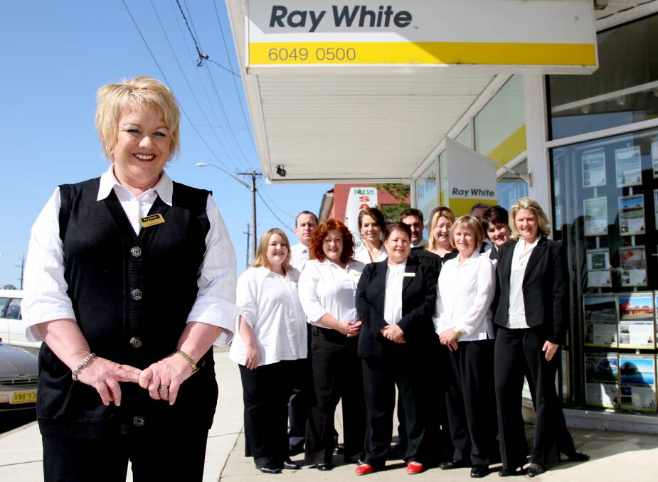Sharon Jacka pictured with Ray White Albury staff back in 2009.