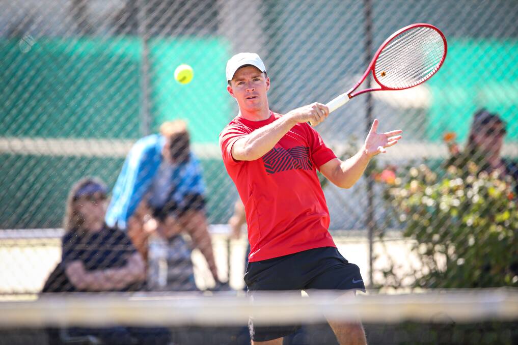 CONCENTRATION: Albury's Lewis Ahern in action during his match on Sunday for the annual Albury Easter Tennis Tournament. Pictures: JAMES WILTSHIRE