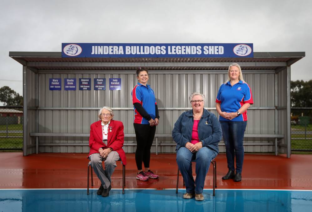 YEARS OF MEMORIES: Mary Fielder, Paula Carr, Sheila Klein and Sharon Riley in front of the 'Jindera Bulldogs Legends Shed' where their names sit. Pictures: JAMES WILTSHIRE