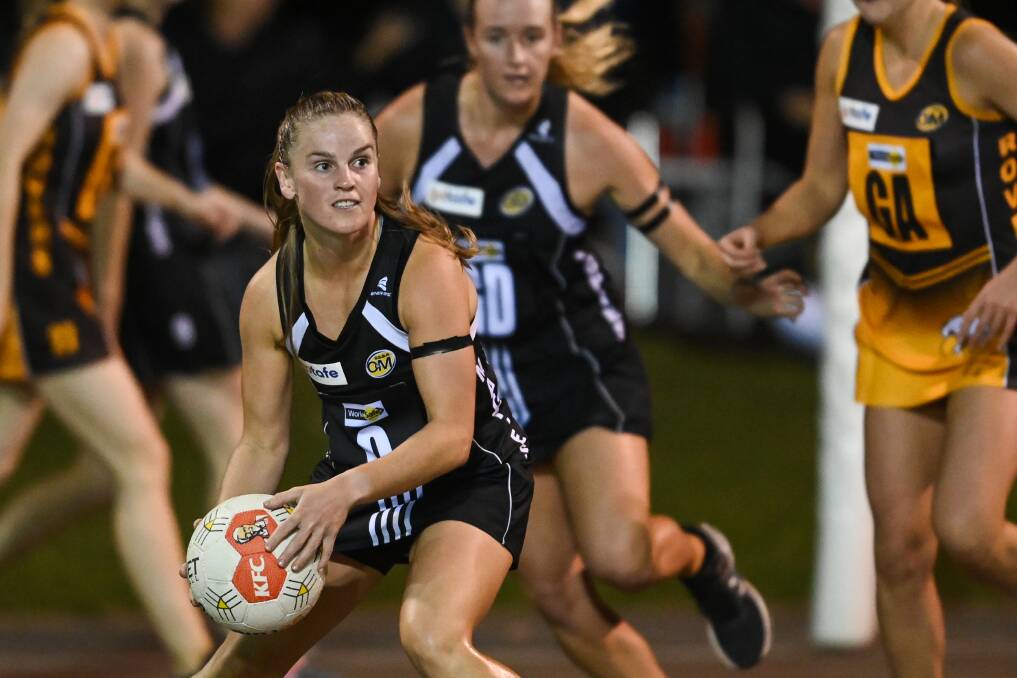 RIVALS: Wangaratta's Issy Byrne was strong for the Magpies in its win against Wangaratta Rovers on Saturday under lights. Pictures: MARK JESSER