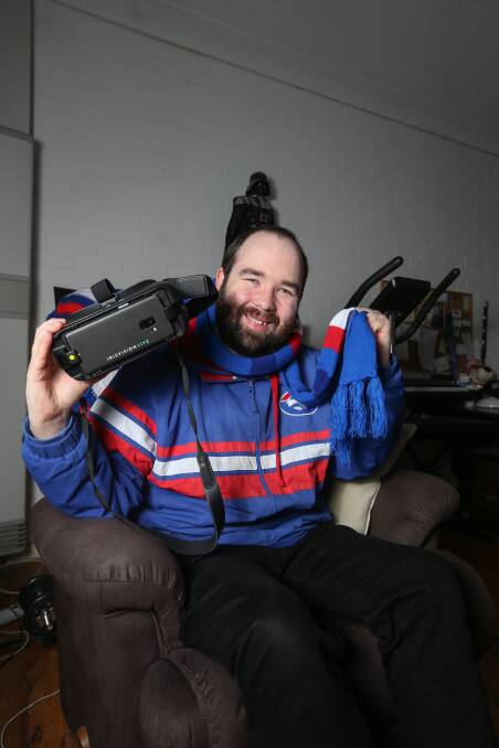FAN: When Wodonga's Lachlan Davidson received a new device to help him see clearer his first thought was to take it to watch his beloved Western Bulldogs play, but due to COVID-19 that's on hold for now. Picture: TARA TREWHELLA