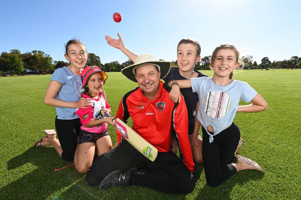 TEAMWORK MAKES THE DREAM WORK: Ben Farnsworth with his children and biggest supporters Olivia, 11, Mia, 7, Tyler, 13 and Mikaela, 9 at Howlong's cricket club, where Mr Farnsworth is now back playing. Picture: MARK JESSER