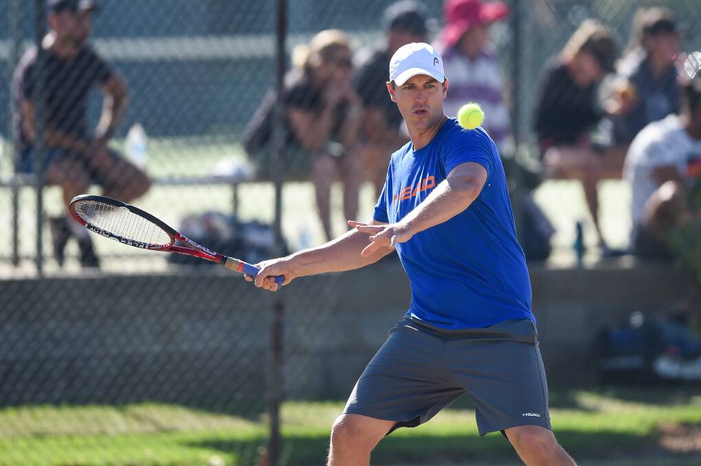 FOCUSED: Albury's Mark Shanahan in action during the 105th Albury Easter Tennis Tournament on Easter Saturday. Pictures: MARK JESSER 