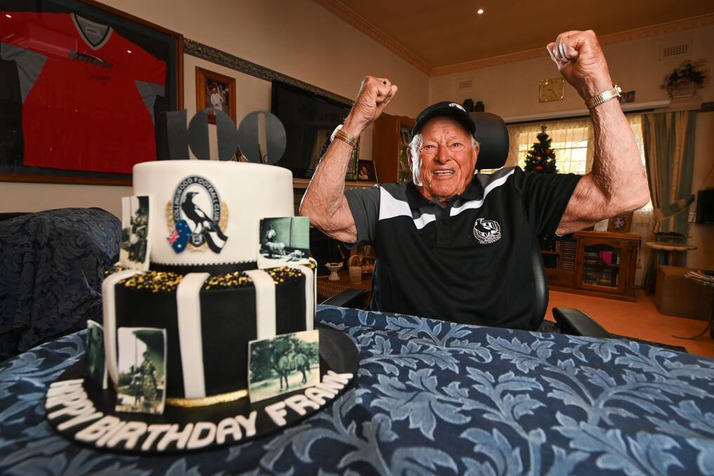 CELEBRATIONS: Wodonga's Frank Parnaby is set to celebrate his 100th birthday on Monday surrounded by his family as he shares his birthday cake in his beloved Collingwood colours. Picture: MARK JESSER