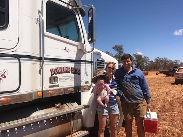 WORKING THE LAND: Holly with daughter Adelaide and husband Tom working up in the family farm in Ungarie during harvest recently.