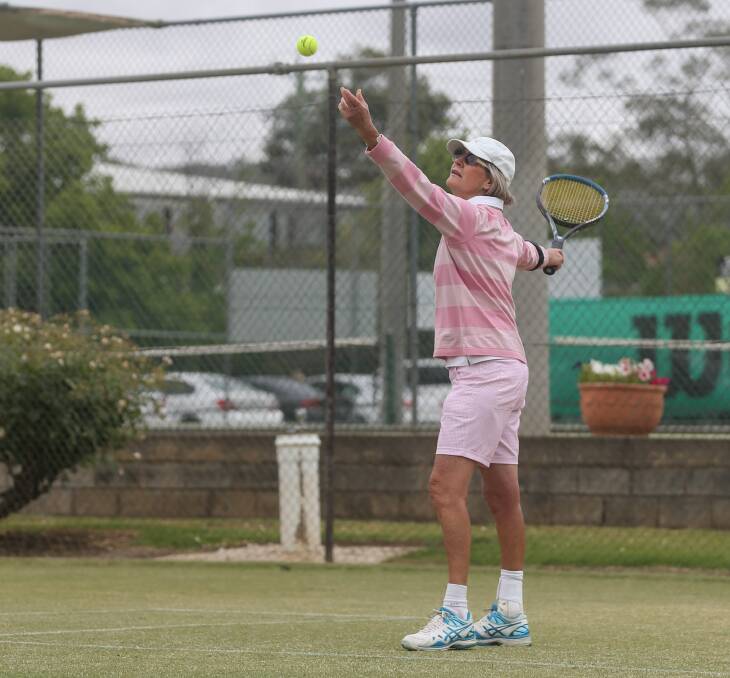 HOLDING SERVE: Janny Molesworth serves to her opponents during ladies pennant at the Albury grasscourts. Picture: TARA TREWHELLA.