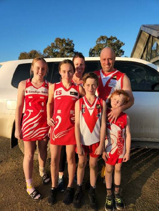 Narelle and Darryn McKimmie with kids Paige, 14, Madi, 12, Lachy, 10 and Brax, 6 after all playing for Federal on the weekend