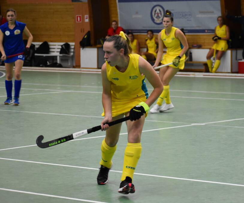 GIVING HER ALL: Sutherland in action representing the women's under-21 Australian indoor hockey team while competing in Russia last year.