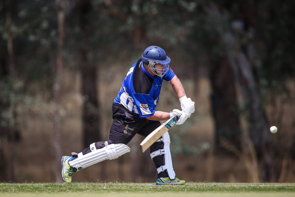 VICTORIOUS: Corowa coach Daniel Athanitis in action with the bat during his side's first game back from the break in Baranduda on the weekend.
