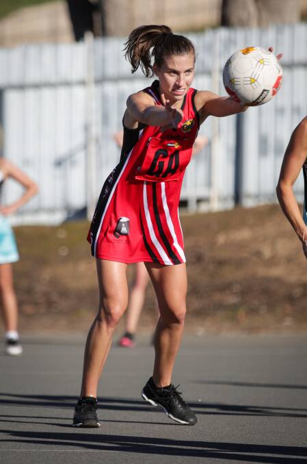 FEEDS THE BALL: Myrtleford shooter Saige Broz passes the ball during the Saints and Panthers game in Lavington on Saturday. Pictures: JAMES WILTSHIRE