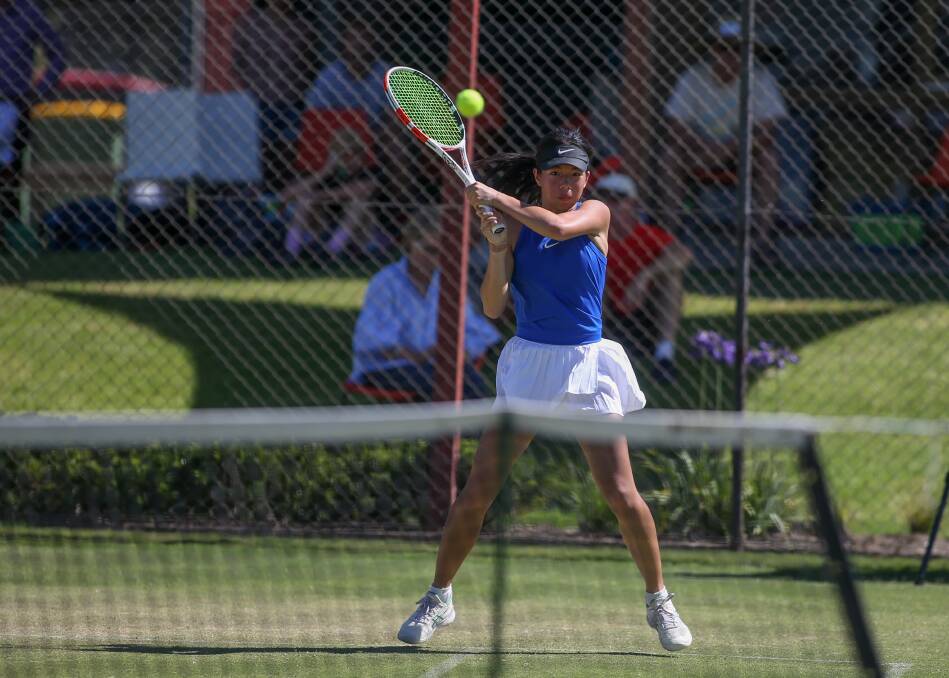 IN THE ZONE: Margaret Court Cup's 2021 AMT Women's Singles winner Lily Lin of Sydney plays a backhand during the final in Albury yesterday.