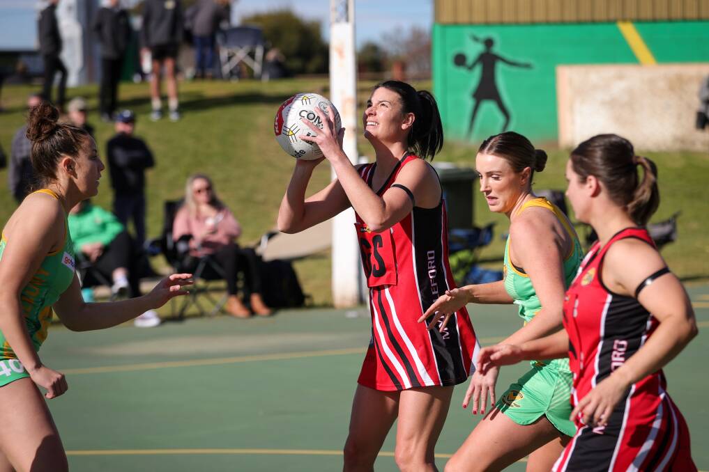 CONCENTRATION IS KEY: Myrtleford's Rebecca Piazza lines up her shot against North Albury on the weekend, with the goal shooter helping the Saints to a narrow one goal victory at Bunton Park. Picture: JAMES WILTSHIRE
