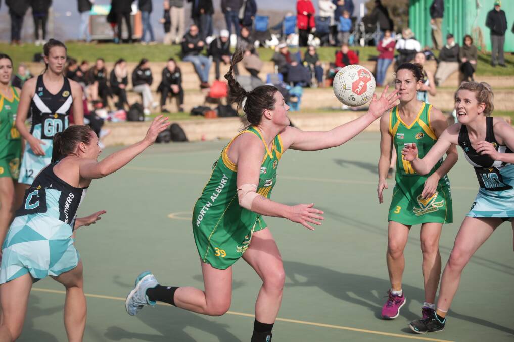 DETERMINED: North Albury defender Emma Mahady fights for the ball during the Hoppers' upset win on Saturday. Pictures: JAMES WILTSHIRE.