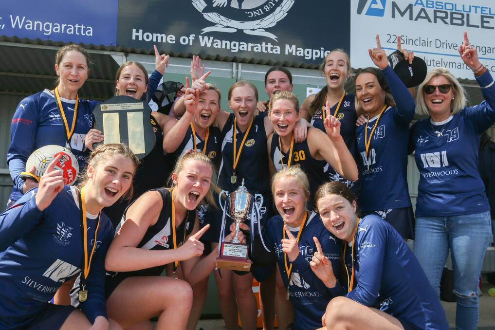 OVER THE MOON: Yarrawonga's C-grade side celebrates taking out the flag after they defeated Corowa-Ruthergeln by 10 goals on Sunday.