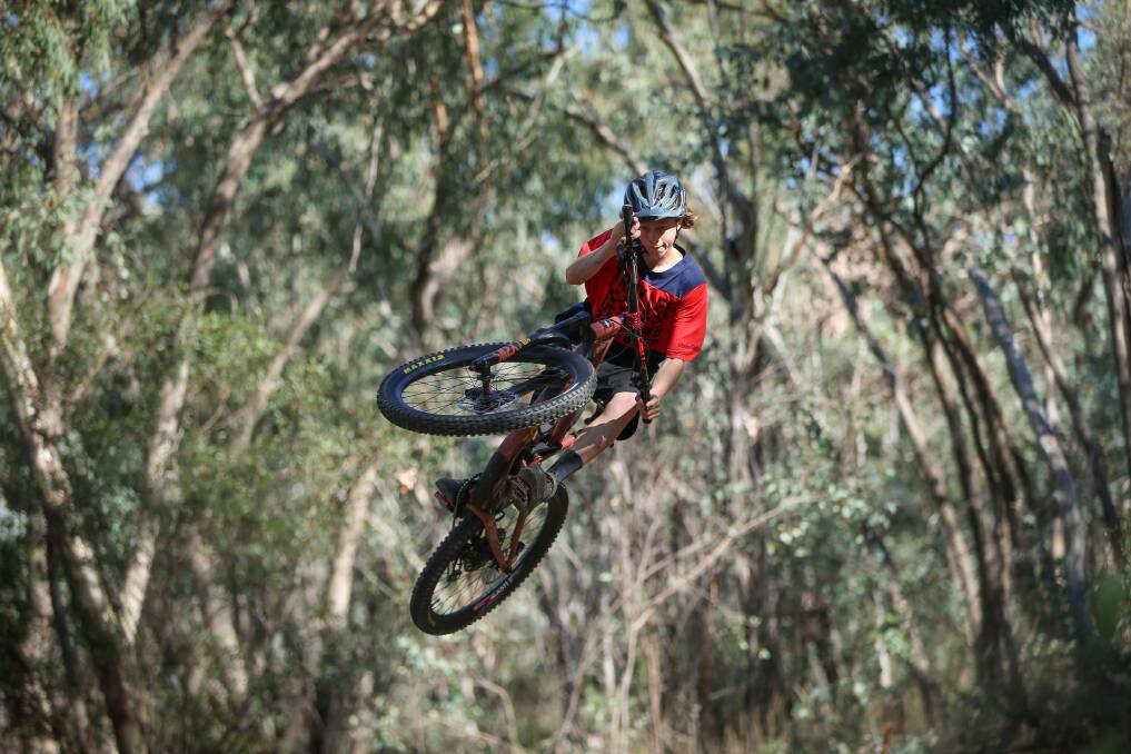 YOUNGSTER'S FLYING HIGH: Border mountain bike rider Ollie Davis has left for a trip of a lifetime, bound for Europe to contest several World Cup racing events. Picture: JAMES WILTSHIRE