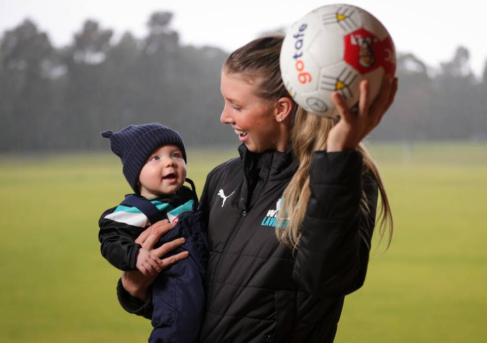 SPECIAL MOMENTS: Lavington netballer Sarah Meredith and her son, James. Meredith is finding her feet back in the Ovens and Murray League netball competition after becoming a mum this year. Picture: JAMES WILTSHIRE