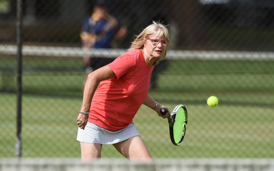 CONCENTRATION: Gail McNeil sends a forehand to her opponents during ladies' pennant action in Albury on Tuesday. Picture: MARK JESSER