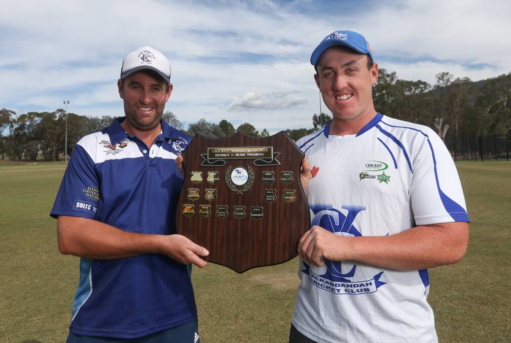 Kiewa coach Ben Curphey and Yackandandah captain Bailey Glass with the CAW District shield ahead of the grand final. Picture: TARA TREWHELLA