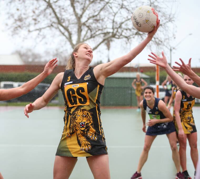 REACHING FOR SUCCESS: Former Albury Tigers' star Jess Garland has helped Yackandandah to their third straight high-scoring win on the weekend.