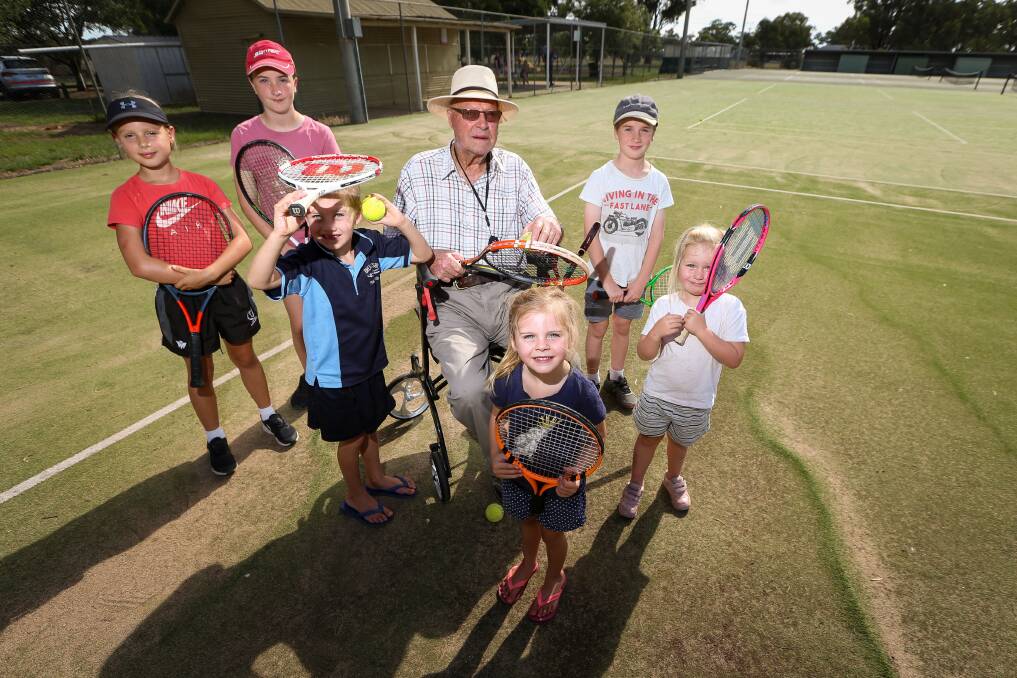 C'MON: Brocklesby tennis club's oldest meber Len Schilg with youngsters Asha Franks, 9, Olivia White, 11, Mack Schilg, 6, Ruby Schilg, 4, Isaac White, 9, and Evie I'Anson, 3, at the town's courts. Picture: JAMES WILTSHIRE
