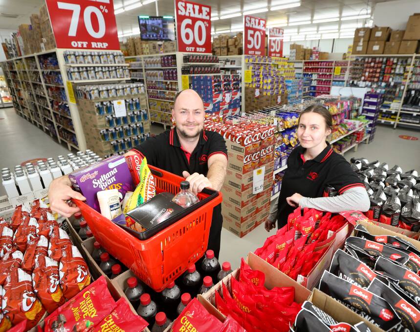 STOCKED: NQR regional manager Will Lockwood and project manager Kayla Reynolds are waiting for the finishing touches to be completed at the new Albury store. Picture: JAMES WILTSHIRE