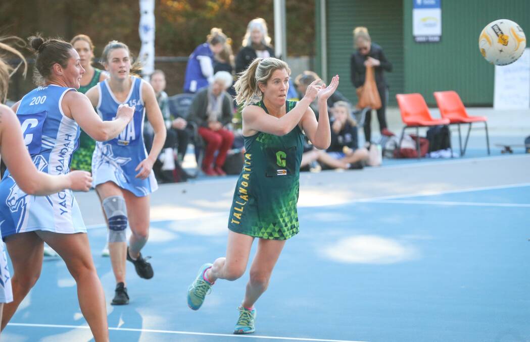 STAR: Tallangatta's Anna Avery passes the ball off to one of her Hopper teammates during the side's win against Yackandandah on Saturday. Picture: JAMES WILTSHIRE