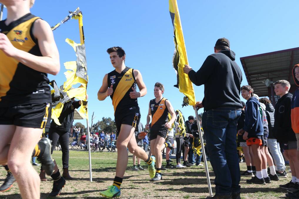 COURAGEOUS EFFORT: Albury running out onto Martin Park before they put undefeated Wodonga to the test on Sunday.