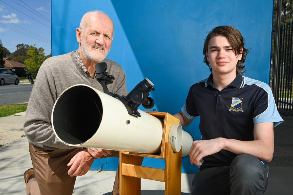 STAR: Astronomical Society president David Thurley with telescope recipient Hunter Jackson of Murray High School. Picture: MARK JESSER
