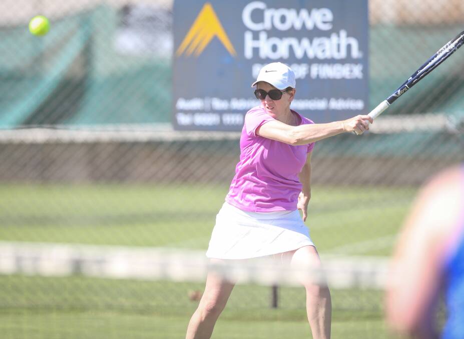 IN THE ZONE: Bulle's Helen Curtis unleashes a forehand on her opposition during Tuesday Ladies Pennant in Albury. Picture: JAMES WILTSHIRE.