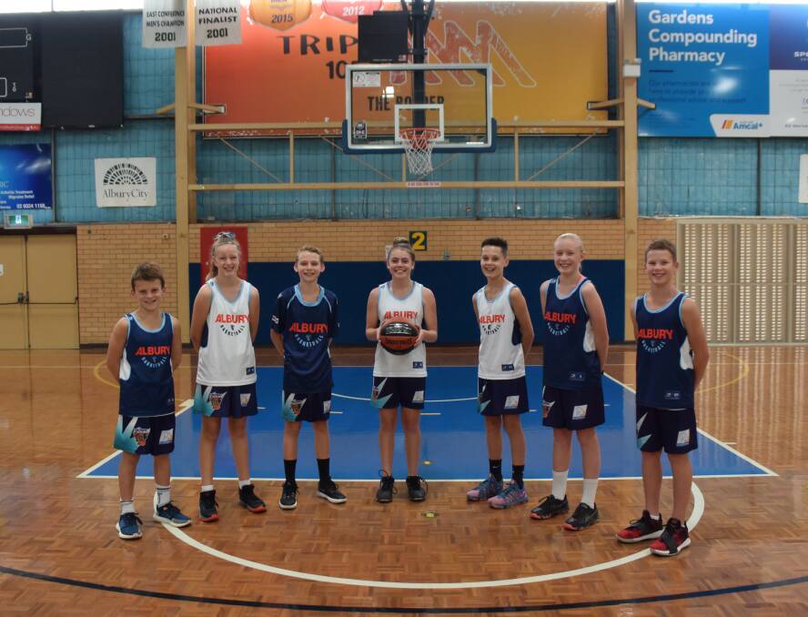 Albury's Cooper Hall, Mackenzie Thomson, Jake Bauerle, Molly McLaren, Sonny Junck, Zali Sims and Oliver Mack ahead of the Australian Country Junior Basketball Cup.