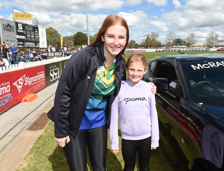 YOUNG TALENT: This year's netball Rising Star recipient and North Albury best and fairest winner Mia Duryea with her cousin Abbey at the Ovens and Murray grand final in Wangaratta on the weekend. Picture: MARK JESSER