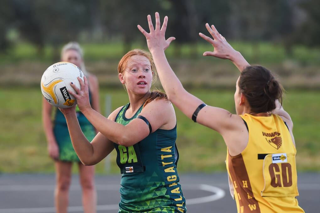 CLOSE CALL: Tallangatta's Molly McCarty looks for teammates during her side's thrilling one-goal win against Kiewa Sandy Creek on Saturday. Picture: MARK JESSER.