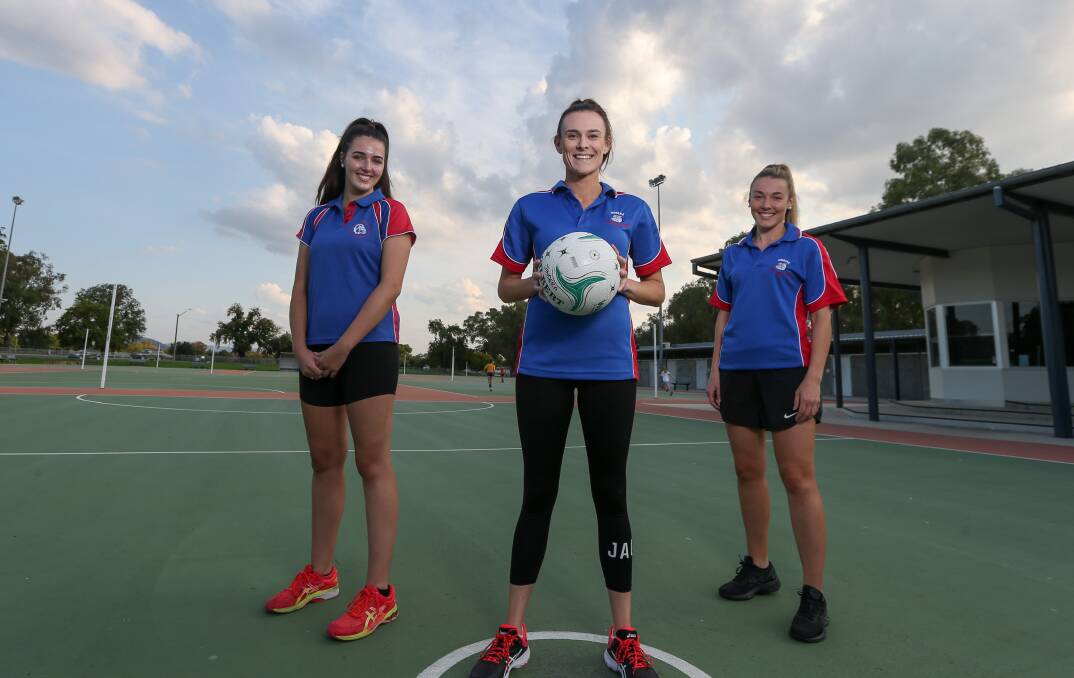 WAIT AND SEE: Jindera coach Tegan Vogel alongside her cousin Chelsea Burns and sister Tayla. The Bulldogs have finished the Hume League home and away netball season in second spot and are now hoping for finals.