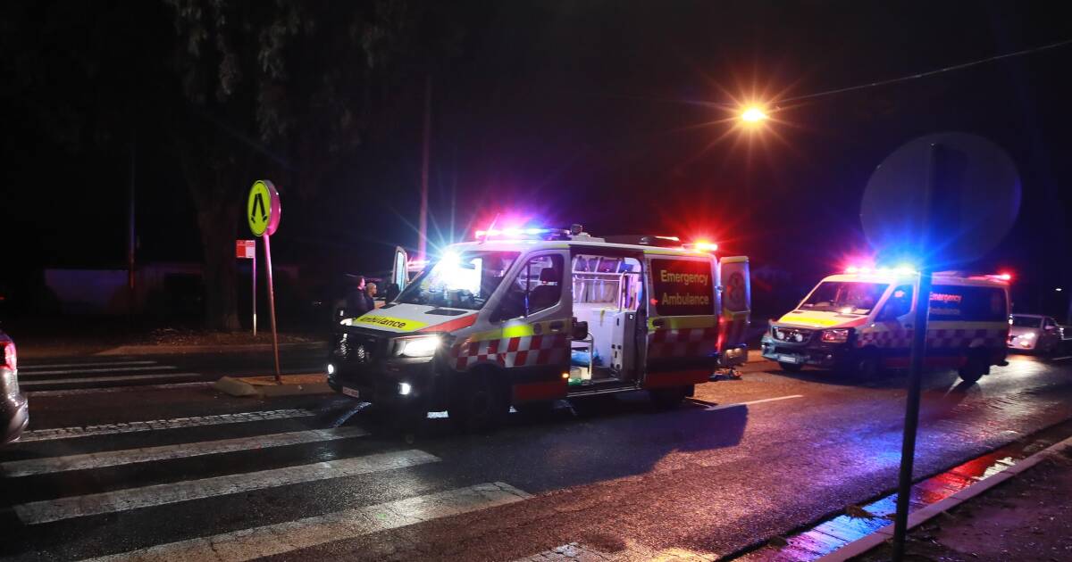 Paramedics respond to reports of a pedestrian hit on June 17. Picture: Les Smith 