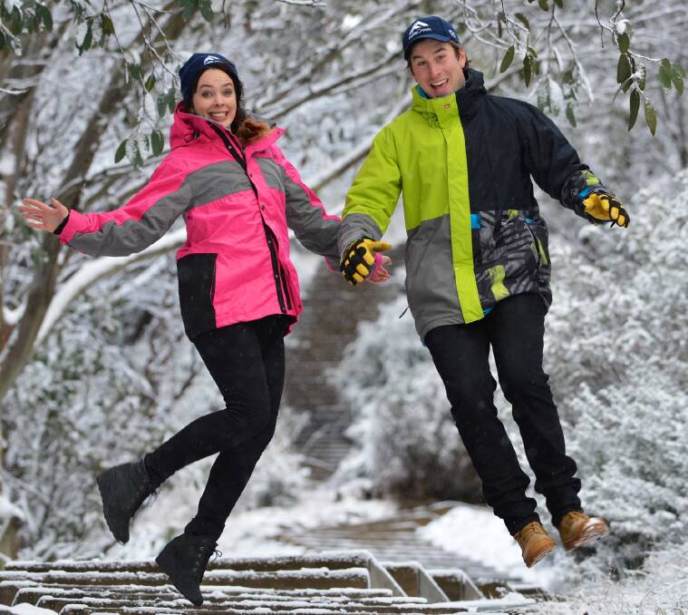 PUMPED UP: Asha Martin and Nick Cundy having fun at Falls Creek. Pictures: CHRIS HOCKING