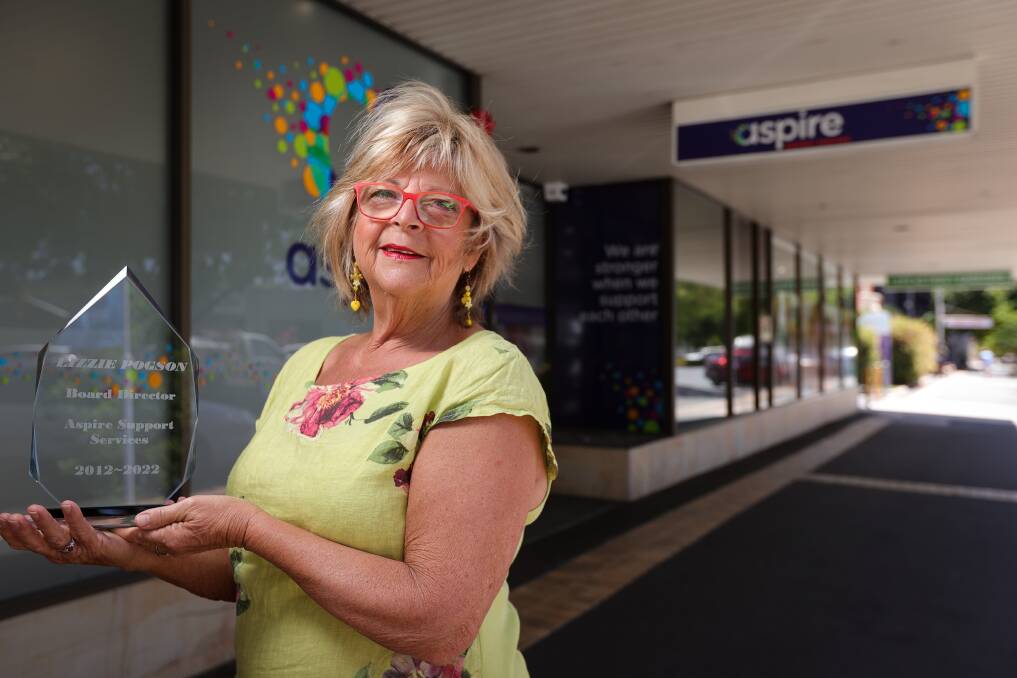 Longstanding Aspire board member LIzzie Pogson with the commemorative memento honouring her 10 years of service to the disability support organisation. PIcture by James Wiltshire