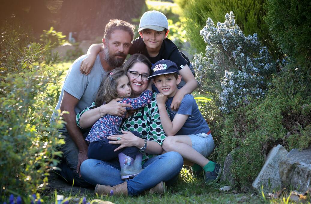 LIFE ... INTERRUPTED: Sarah Waters, 38, who needs life-saving brain surgery, with her partner Andrew Kavanagh and their children Oli, 10, Sadie, 3,  and Archie, 7. Picture: KYLIE ESLER