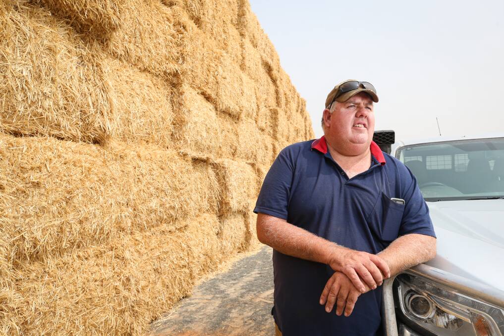 HAY HELP: Walla's Jason Schilg has helped co-ordinate a hay-making effort that will see 2500 bales delivered to fire-affected farmers in the Upper Murray.