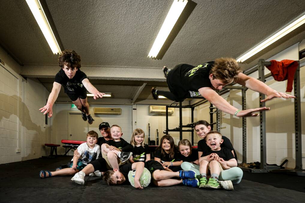 LEAP OF FAITH: Trainers Jack Sharp and Jorge Beavan with Risky Kids Albury participants and manager Shannen Hocking (back left). Picture: JAMES WILTSHIRE