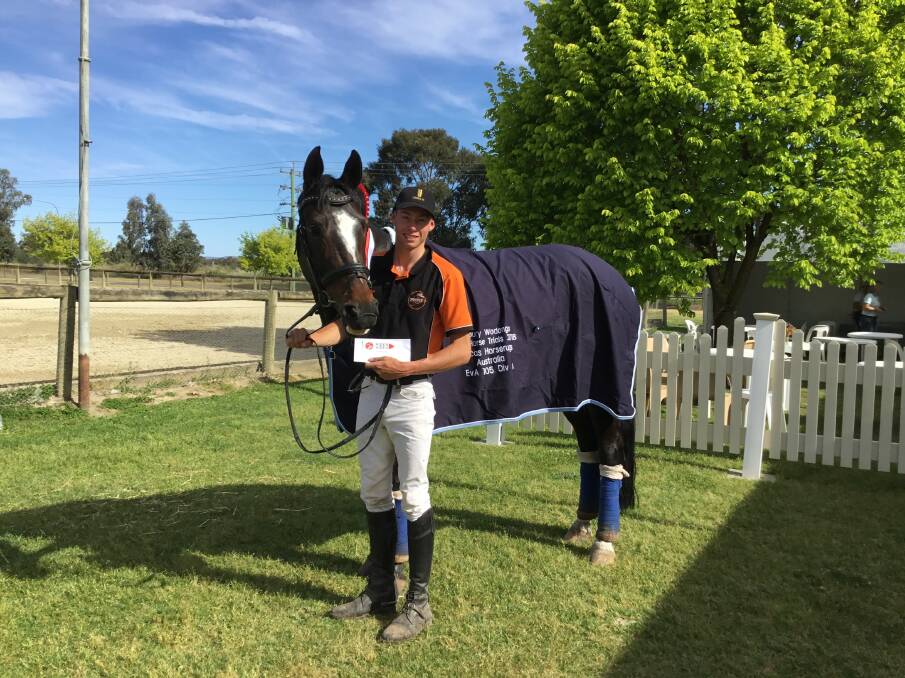SHOW STOPPER: EVA105A winner Samuel Jeffree and Woodmount Lolita accept their prizes and rug at presentation.