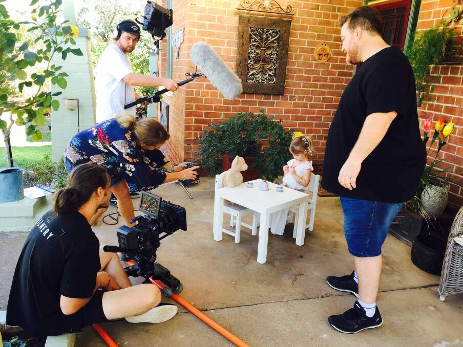 LIGHTS, CAMERA: It was action stations at Henty on Thursday for the filming of country music star Sara Storer's single Raindance where little Alice White, 4, stole the show. 