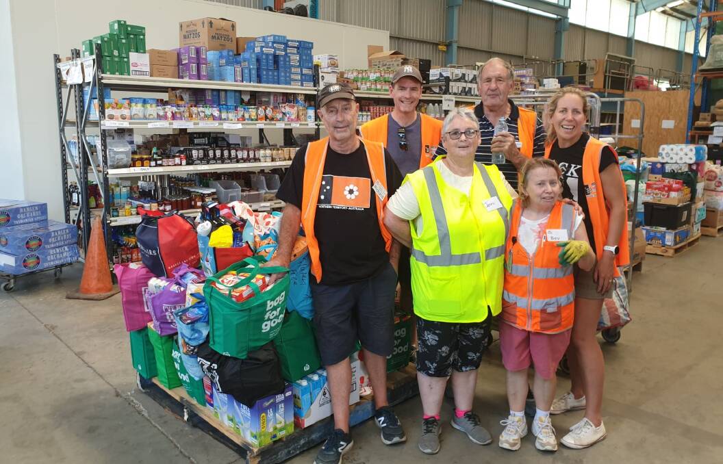 HAPPY TO HELP: Albury-Wodonga Regional Food Share crew Richard Robertson, Simon Welsh, Doug Gammon and Allison Welsh with Jenni Sceriha and Bev Campbell.