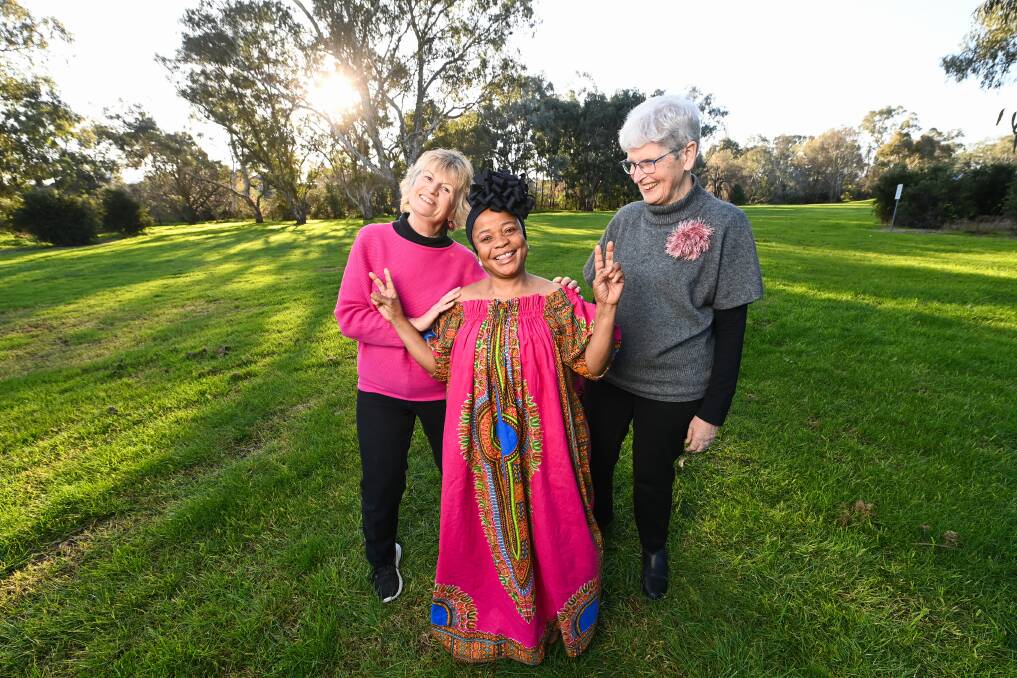 Apolina Kakonga (centre) with Border refugee advocates Tracy Horner and Dr Penny Vine, who are asking the community to support a fundraiser to bring Apolina's relatives to Australia from a Ugandan refugee camp. Picture by Mark Jesser