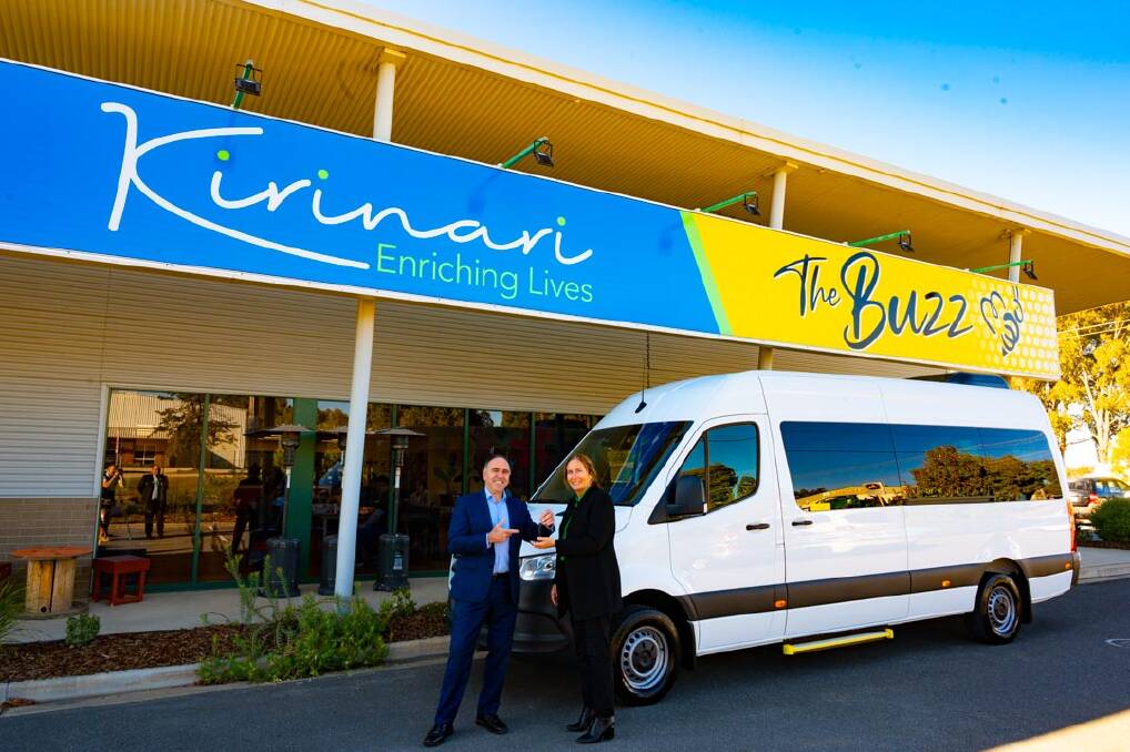 ALL ABUZZ: Kirinari Community Services CEO Dianne Lynch takes delivery of an initial four Mercedes Benz Sprinter transport buses from Terry Koutsouras, commercial vehicles manager at Interleasing Australia. PIcture: SUPPLIED