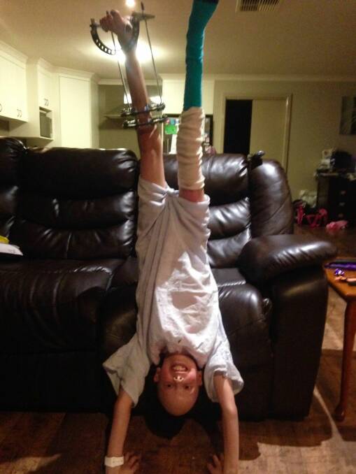 STANDING STRONG: Matilda, a keen gymnast, demonstrates how she plans to kick cancer!