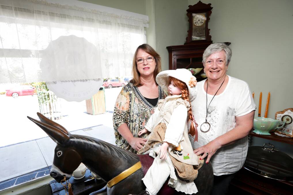 SUPPORT: Jindera Village Antiques owner Janelle Faust with mayor Denise Osborne and shop "mascot" Jack (ass) "the deadbeat donkey". Picture: JAMES WILTSHIRE